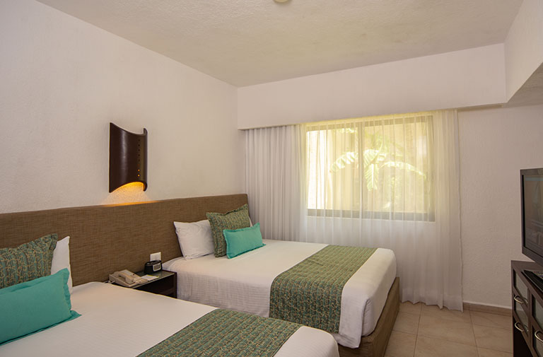 Laguna-Suites-GolfSpa-Habitacion-Camas-1